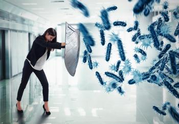 foto di persona con scudo che si protegge da virus
